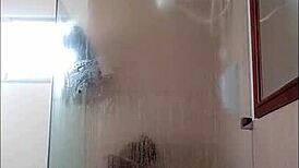 Ebony milf drops dildo in shower blowjob