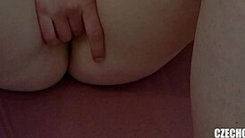 this czech amateur fingers her shaved pussy in private homemade video.