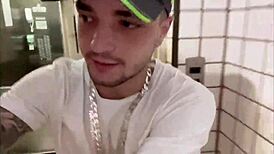 skinny guy deepthroats big cock in chained bondage trailer