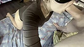 she's sucking his cock, getting cum in her mouth, and having an orgasm