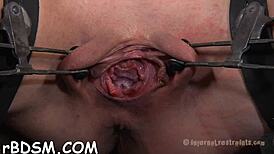 gagged woman endures rough play from hangman