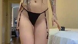 Ariana Sways Seductively in Tiny Bikini Dance