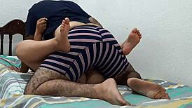 Couple Shares Intimate Moment in Parents' Bedroom