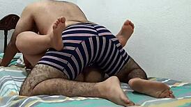 Couple Shares Intimate Moment in Parents' Bedroom