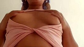 Wow, this sexy petite morena masturbates her wet hairy pussy on the bed!