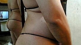 Sexy latina shemale shows big ass!