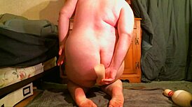 She stretches her fat ass wide and fucks it herself