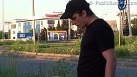 A cute blonde girl gets noticed in public street action.