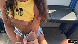 Beautiful woman in her late teens gives a great blowjob on an amusement park Ferris wheel