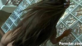 Michelle Maylene flaunts her big tits in lingerie while stroking a massive cock