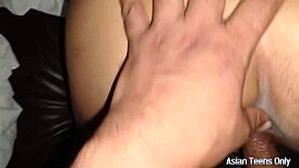 asian ghostzilla squirts while fingering