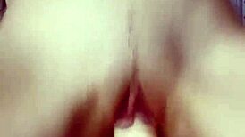 Ki-sim casually rides a huge cock in cowgirl style on the bed.