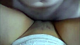 Stressed university student gets relaxing massage from roommate during finals