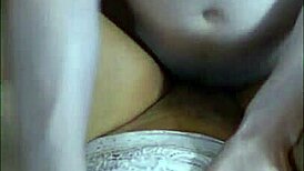 Stressed university student gets relaxing massage from roommate during finals