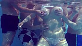 Asian amateurs engage in hardcore group banging, with the girl at the center of a gangbang frenzy.