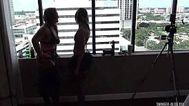 lesbo swingers engage in strap-on play and pussy licking foursome