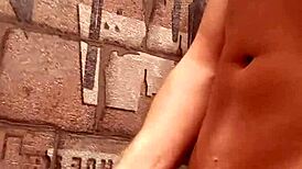 A skinny European teen jerks off a huge cock and cums heavily