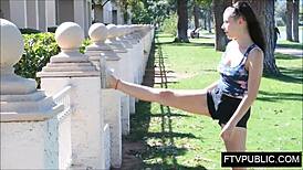 in the park, a nude teen masturbates by fingering her pussy publicly