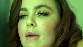 Watch this curvy redhead deepthroat her lover's big black cock