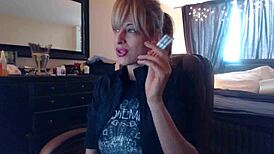 Blonde Sandi Smokes Cigarettes While Squirting on Big Tits