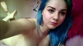 I-I saw this blue haired teen 18+ with pierced nipples and huge tits on webcam.