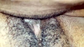 Ebony Lesbian Rubs Hard Clit On Creamy Hole