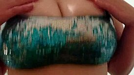 Breasts burst out of bikini at the beach!