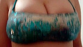 Breasts burst out of bikini at the beach!