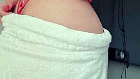 Look at this blonde slut flashing in a towel by the window?