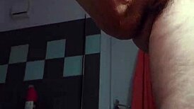 granny shocks by banging hairy pussy with cucumber in kitchen.