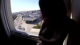 watching her naked body in the hotel window creampie voyeur