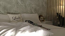 Petite redhead strips down, changes outfits, then teases a soft cock on bed.