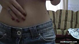 An amateur babe casually strips and teases the camera with playful touches