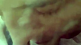 Gay blowjob scene unfolds in a simple encounter.