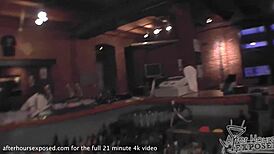 Behind the bar, she gives a blowjob and receives a tittie cumshot.