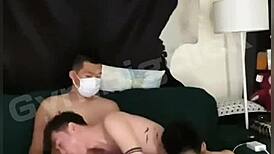 Watch this threesome of gay Asian amateurs fucking bareback with big asses