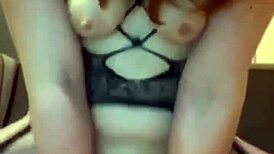 A cam girl rides a toy on webcam