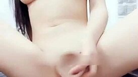 chinese cam girl rides dildo hard