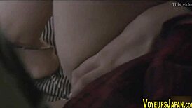 Hey, this asian babe fingerbangs her hairy pussy outdoors.