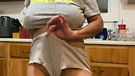 Anna maria continues to dance while washing the dishes