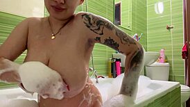 Pregnant Teen 18+ with Big Boobs Enjoys a Sensual Bath.