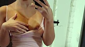 Teen Mia Piper strips and masturbates in front of mirror, ripping clothes off her big tits.