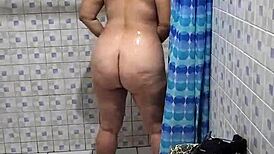 Hidden cam catches curvy Venezuelan neighbor in steamy shower