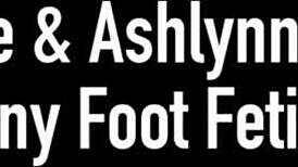 kimber lee and ashlynn taylor share a passionate kiss while indulging in our horny foot fetish desires.