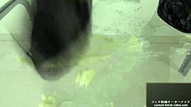 Asian babe stomps noodles in shoes for foot fetish excitement.