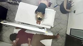 Real video of masseur having sex with woman next to her husband.