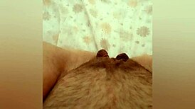 Greta goes to the bathroom and then warms up under the blanket