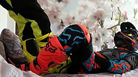 Gay biker treads boots in motocross costume fun