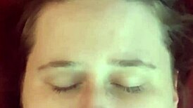 An amateur girl casually gets her face covered in cum