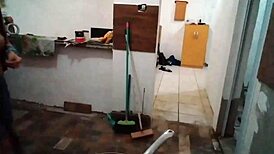 Blonde milf cook Stella Still shows off her big tits in the kitchen wearing red.